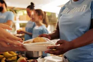 Volunteers serving meals